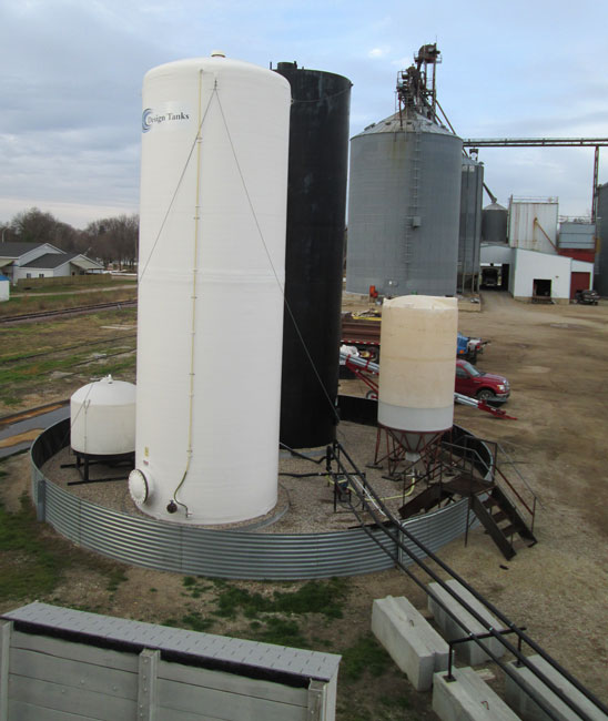 Sioux Steel style outdoor containment with bulk liquid fertilizer tanks. 