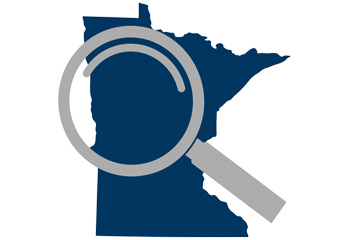 Shape of the state of Minnesota in blue with a magnifying glass over the top of it.