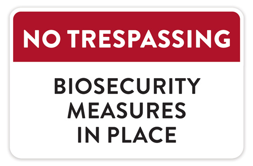 A sign saying No trespassing: biosecurity measures in place