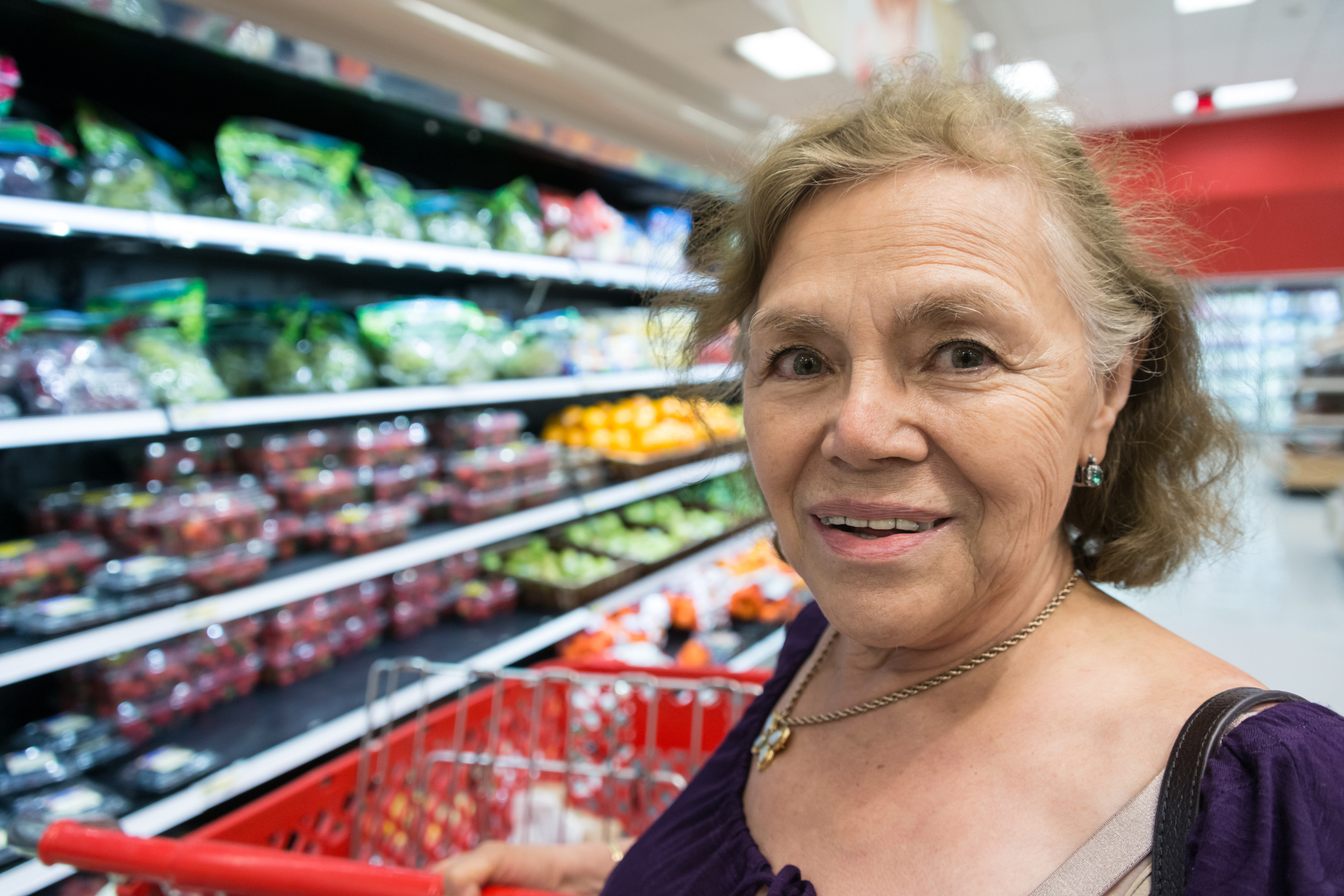 Senior woman buying groceries