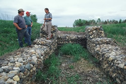 Gabions are wire baskets filled with large stones that are used to stabilize shores and prevent erosion. Photo courtesy of the USDA NRCS